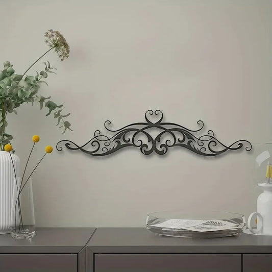 A Vintage-Style Symmetrical Patterned Metal Wall Art Featuring a Scroll with Vine Sculptures