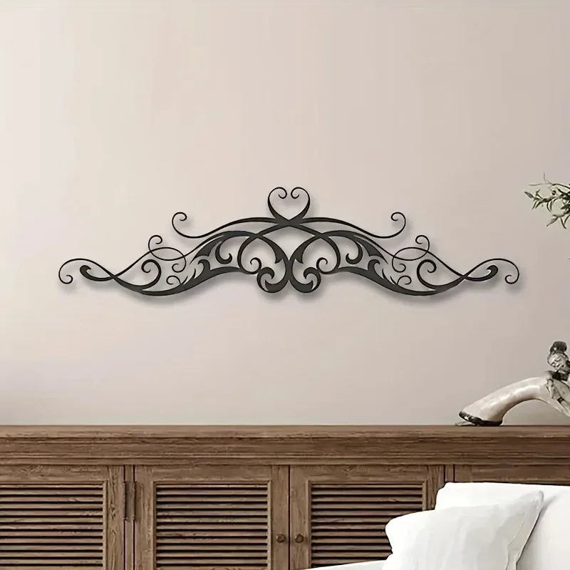 A Vintage-Style Symmetrical Patterned Metal Wall Art Featuring a Scroll with Vine Sculptures