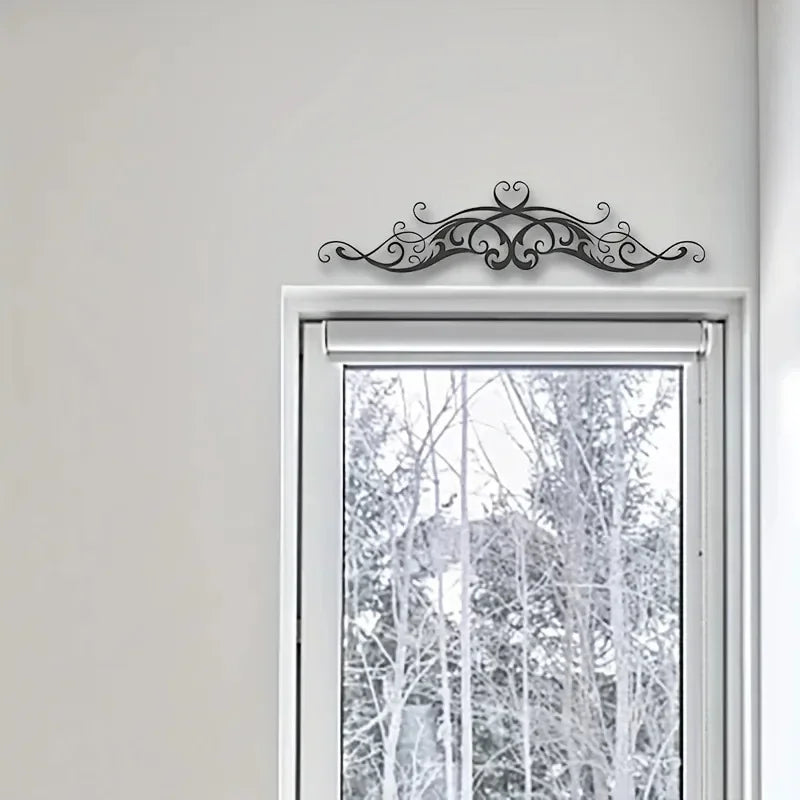 A Vintage-Style Symmetrical Patterned Metal Wall Art Featuring a Scroll with Vine Sculptures